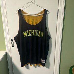 Vintage University of Michigan Wolverines double-side basketball jersey.
